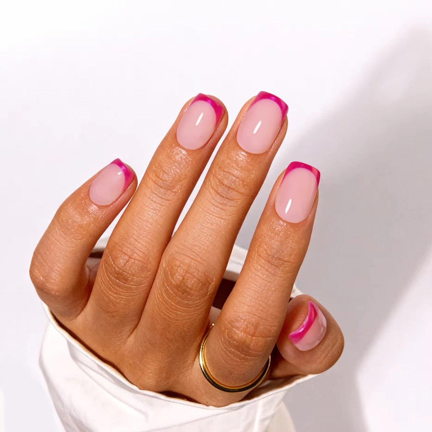 Electric Fuchsia French press-on nails - lifestyle hand shot