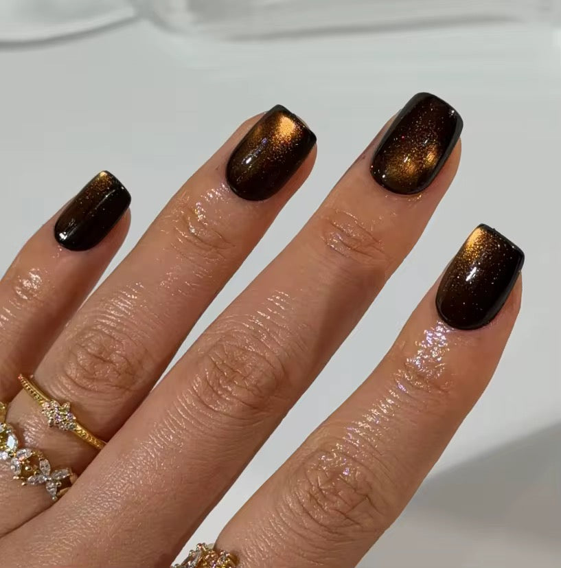 Midnight Ember Glow press-on nails on hand