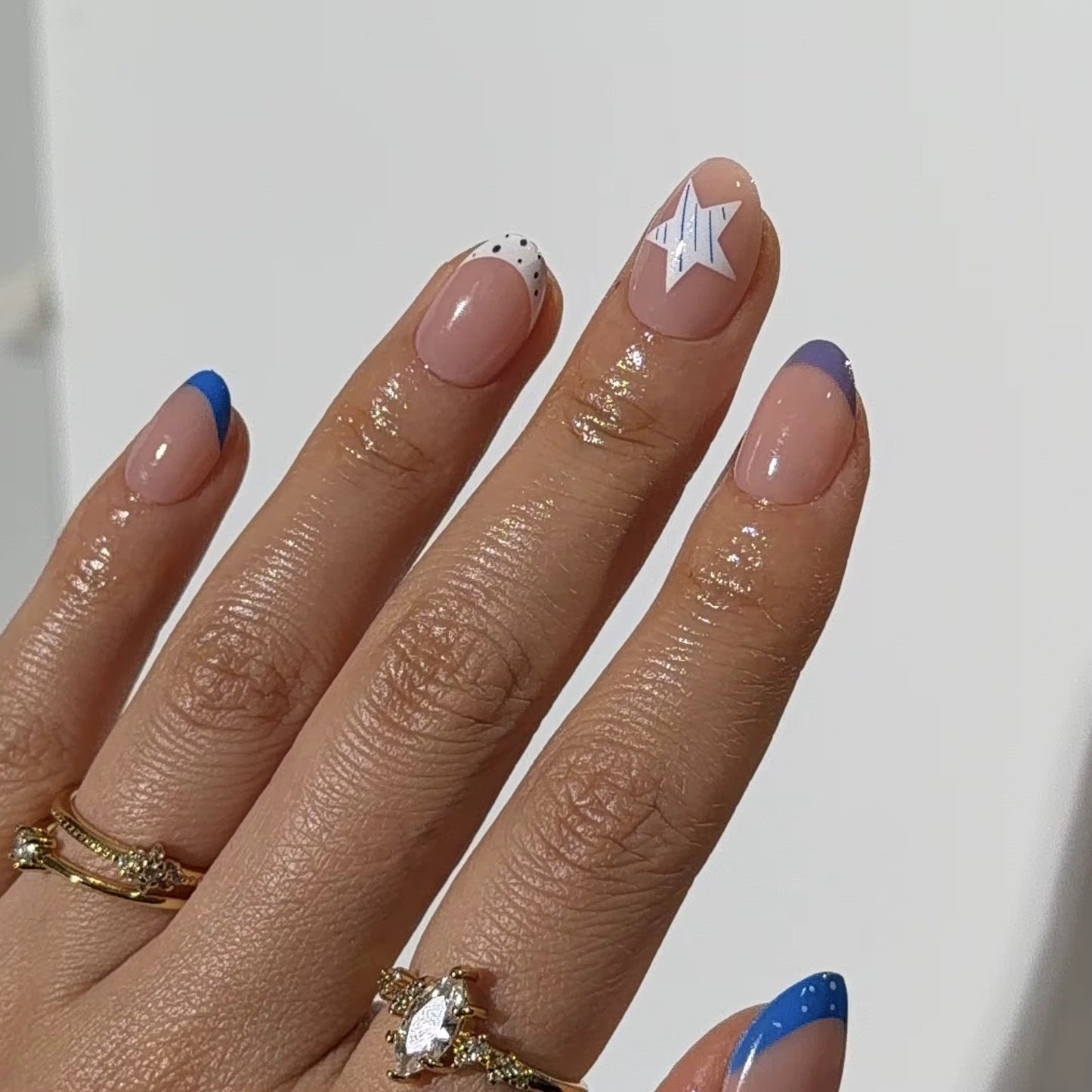 Starry Sky press-ons worn on hand