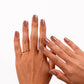Toasted Almond press-on nails on hands