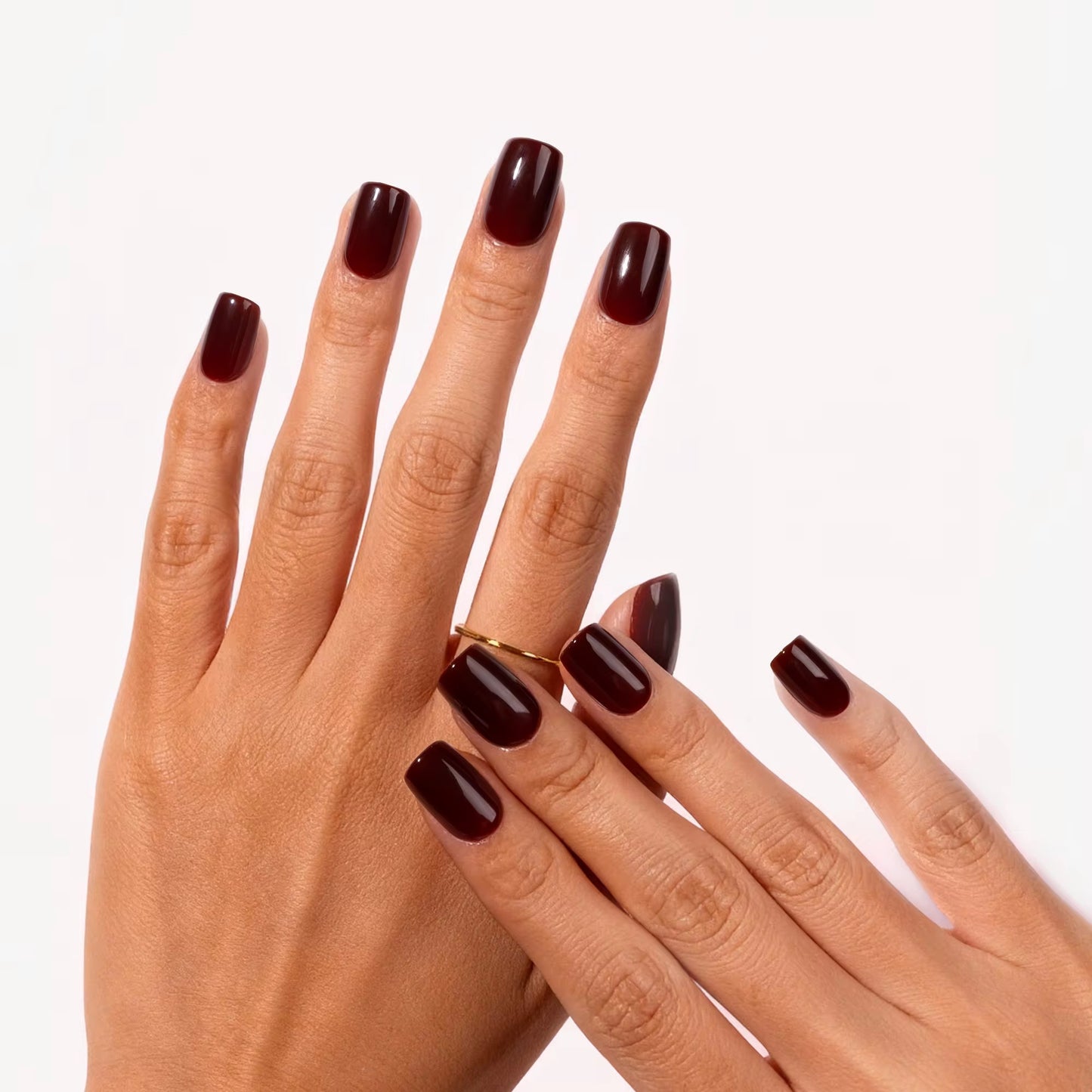 Classic Oxblood Square press-on nails on hands