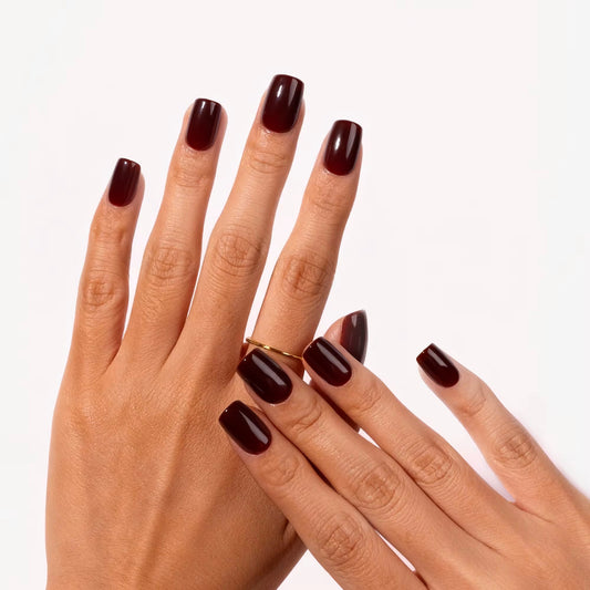 Classic Oxblood Square press-on nails on hands