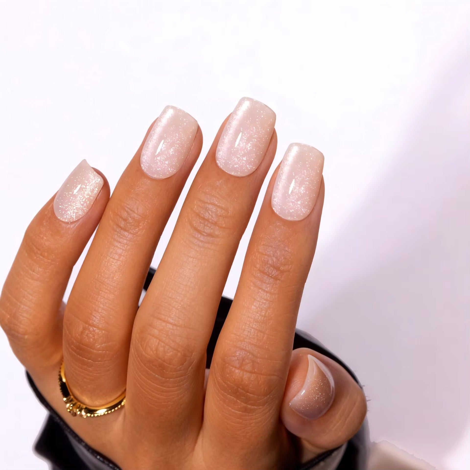 Starlight Shimmer Square press-on nails - lifestyle hand shot