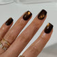 Midnight Ember Glow press-on nails on hand