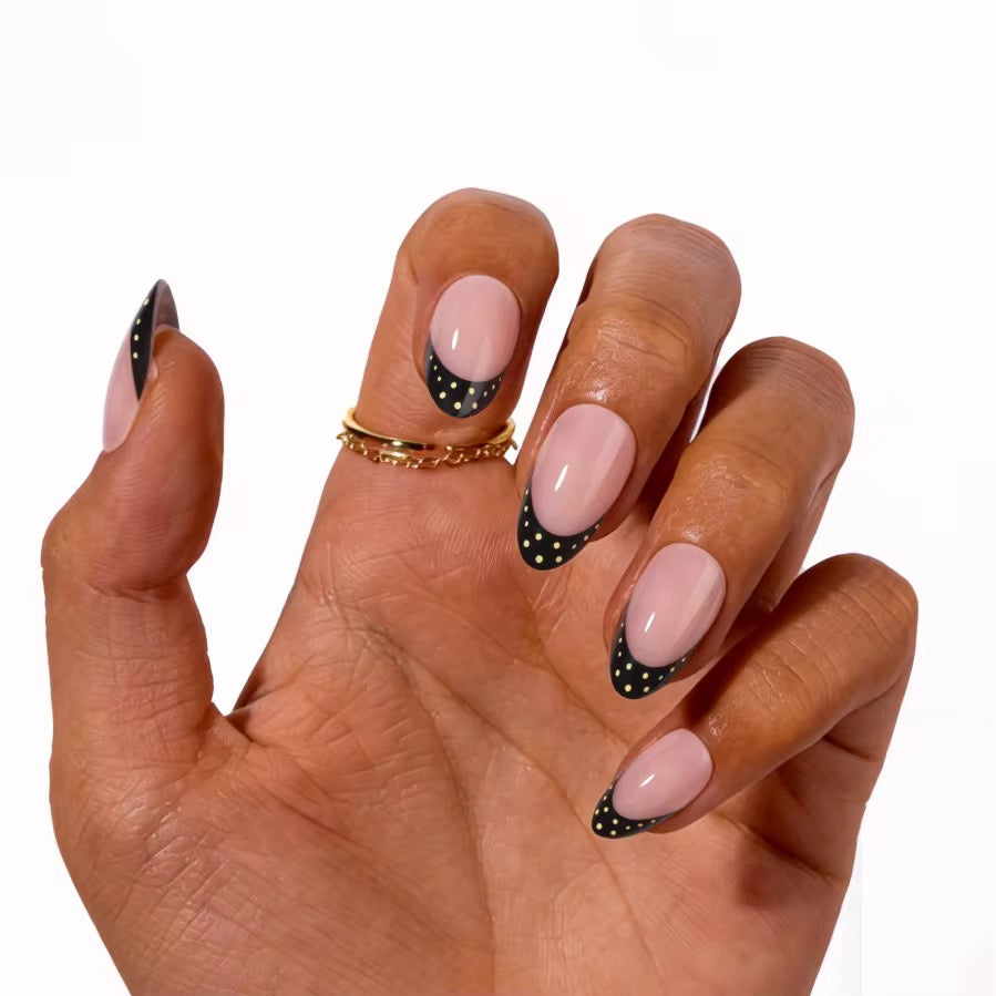 Midnight Polka French press-on nails on hand