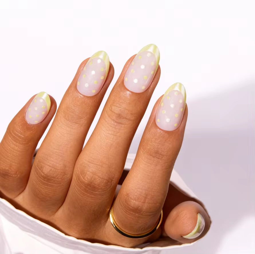 Sunny Lemon French press-on nails on hand
